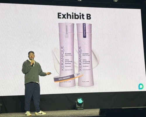 John speaking about marketplace creative on stage